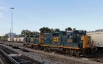 CSX 2059 & 2791 sit idle as train F741 gets built in the background